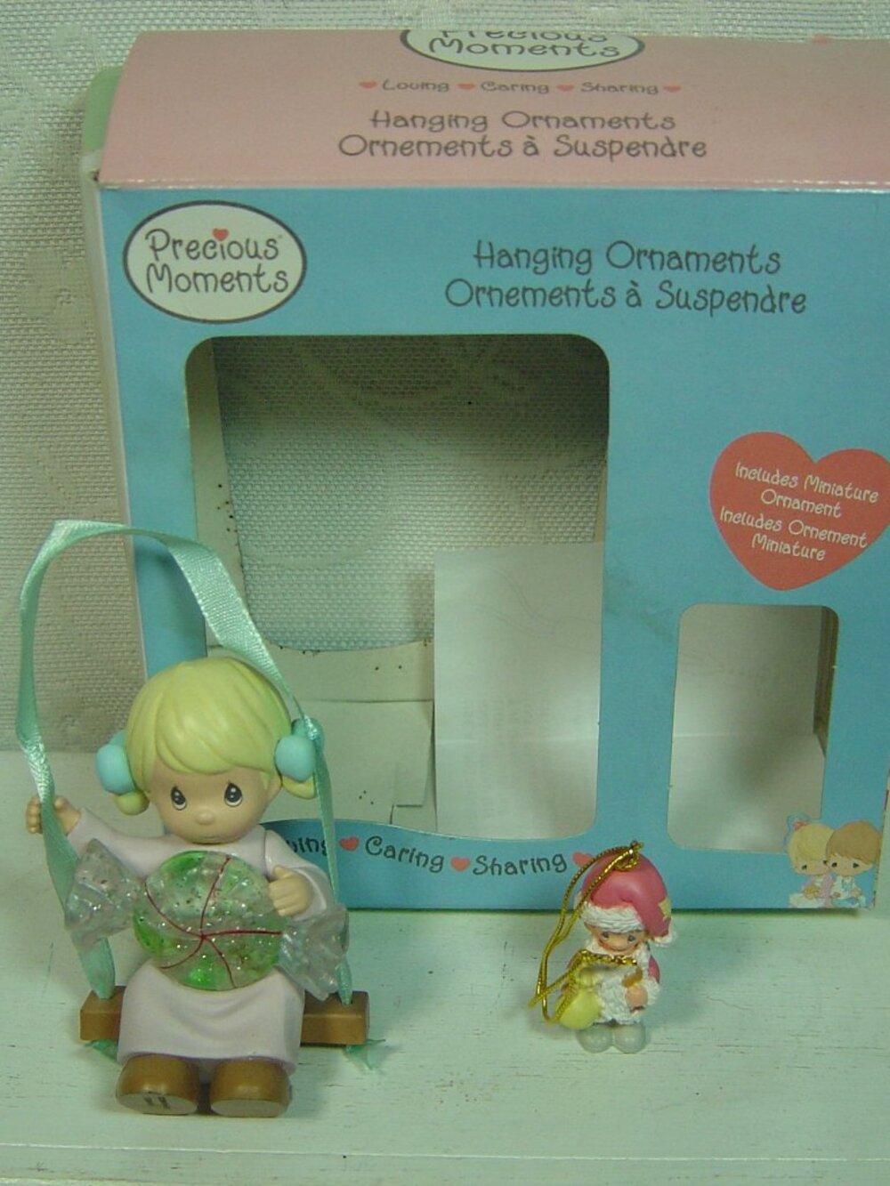 Precious Moments ornament-girl on swing with candy + miniature ornament